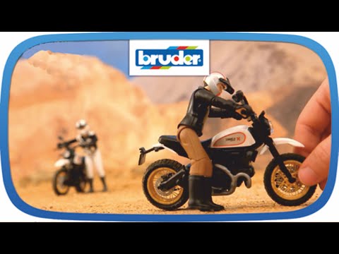 DUCATI DESERT SCRAMBLER MOTORCYCLE WITH DRIVER - BRUDER (63051)